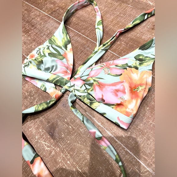 Kona Sol Leaf Print Cross Straps Bikini Top
Adjustable Back - Picture 3 of 6